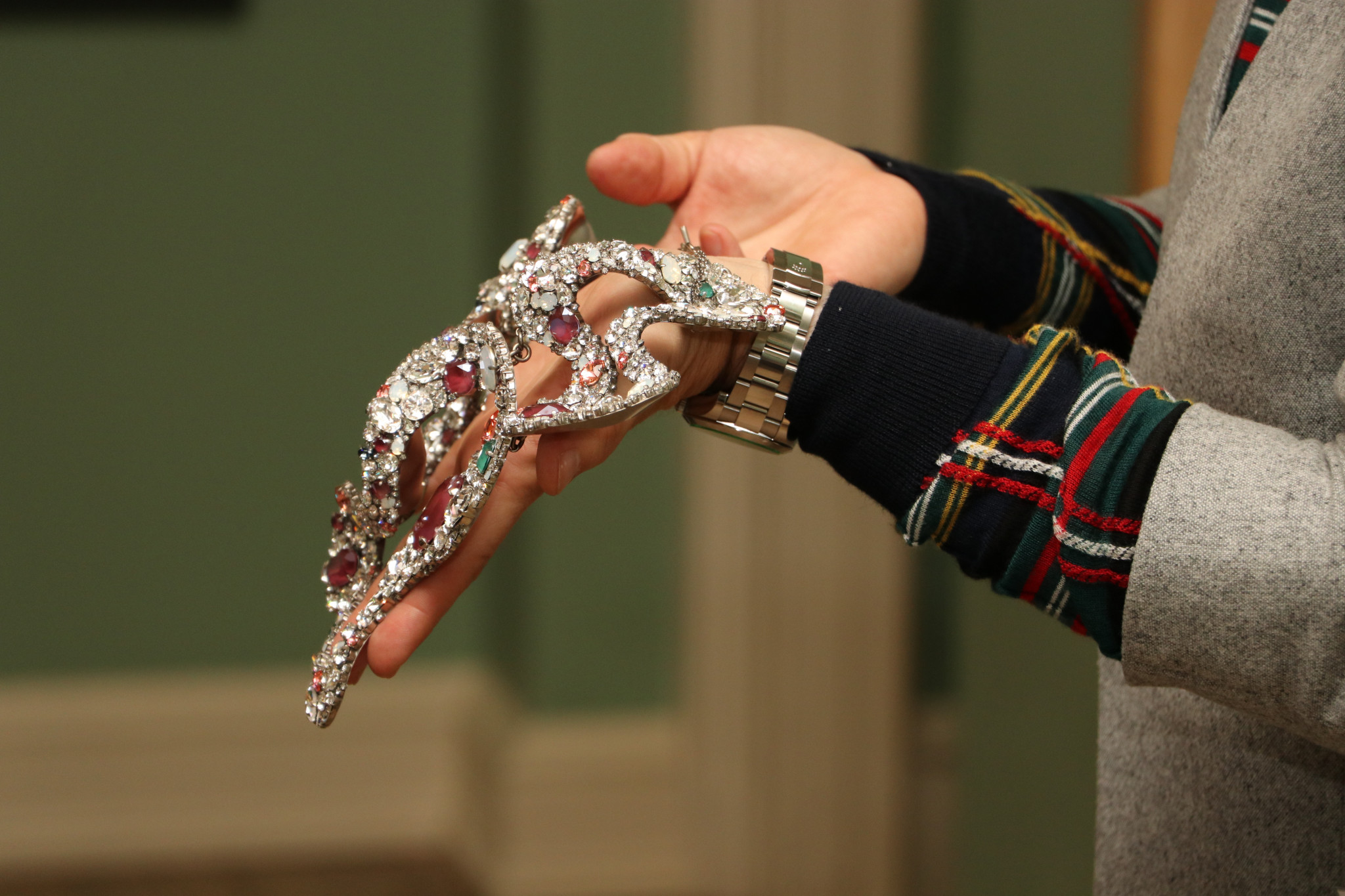 Image of someone holding a jewellery