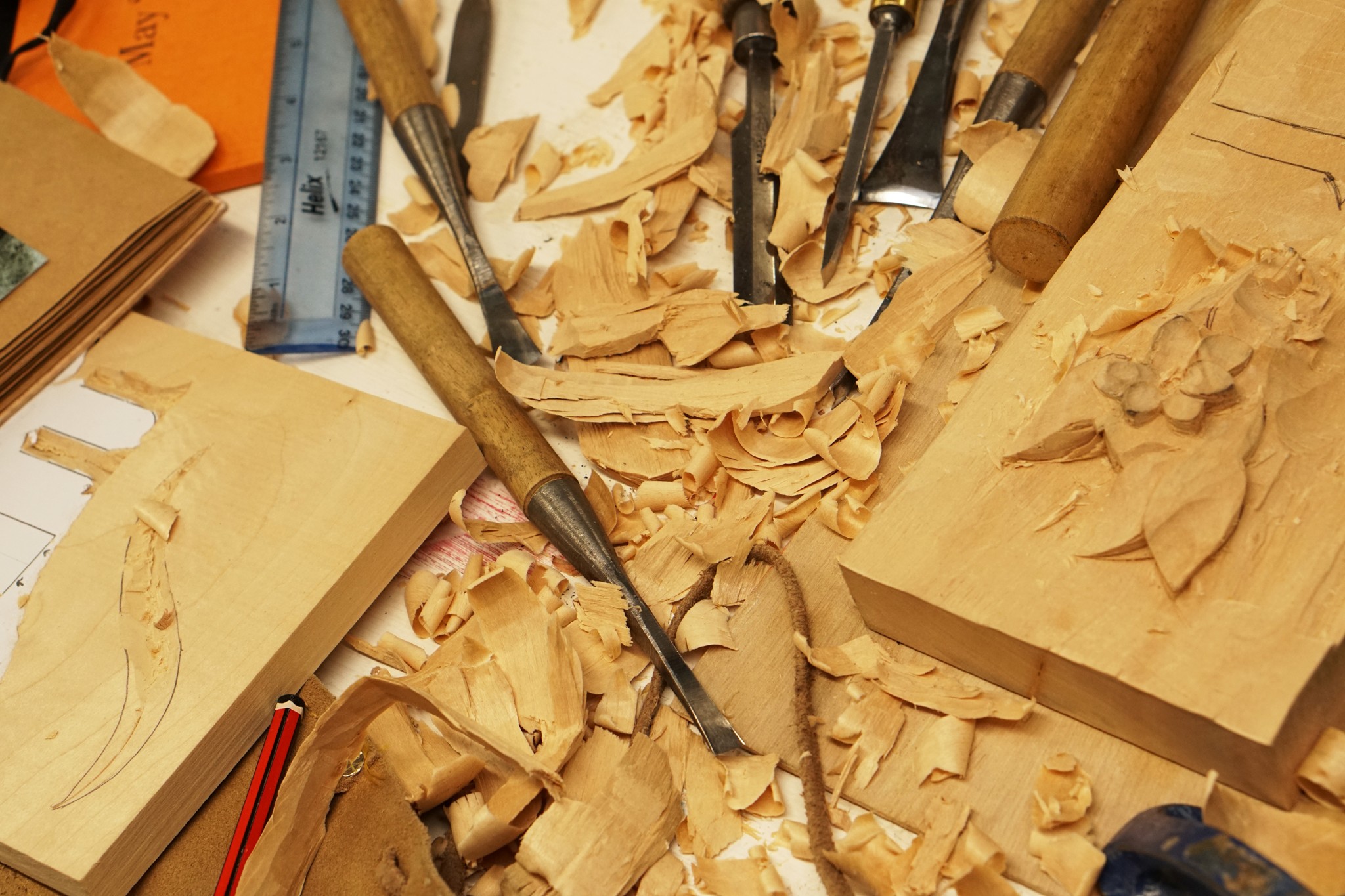 Image of wood carving tools on a bench