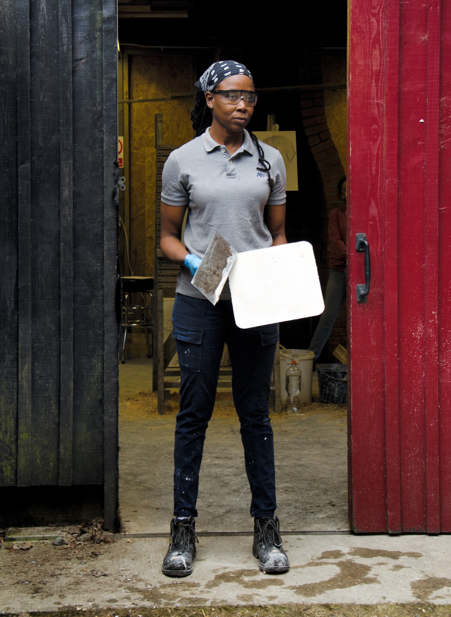 Image of the engineer Patrice Francis holding tools