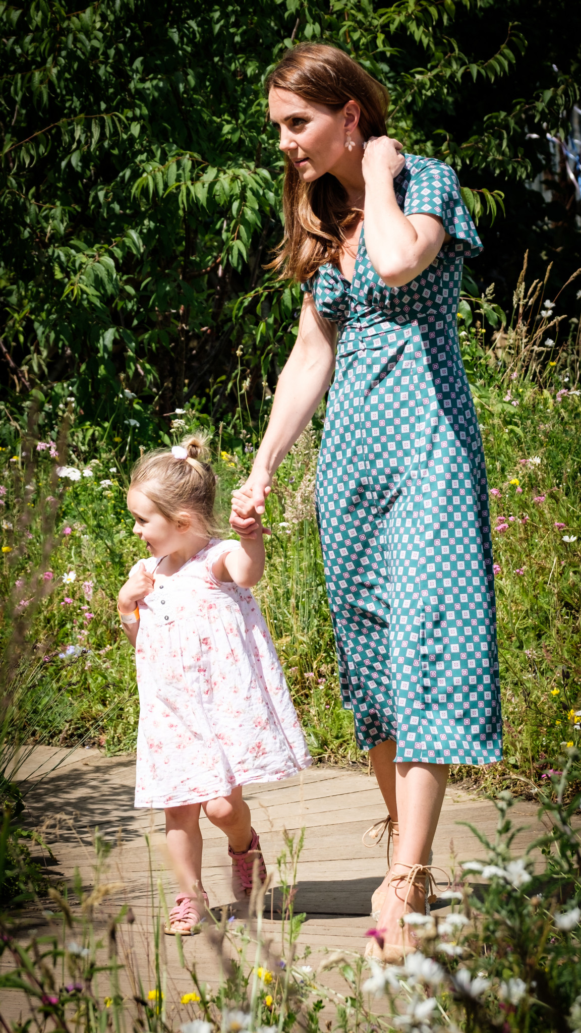 A photo of The Duchess of Cambridge and a little girl